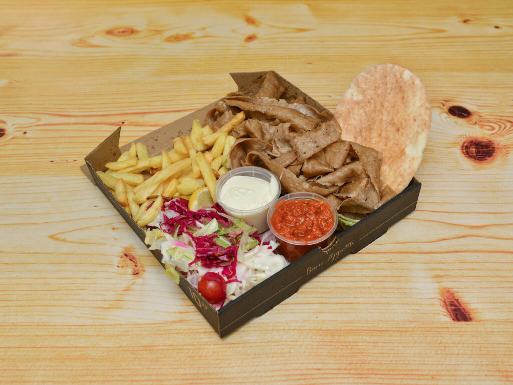 Sizzling doner kebab with chips, sauce, salad and bread served at chick 
pizz Cramlington